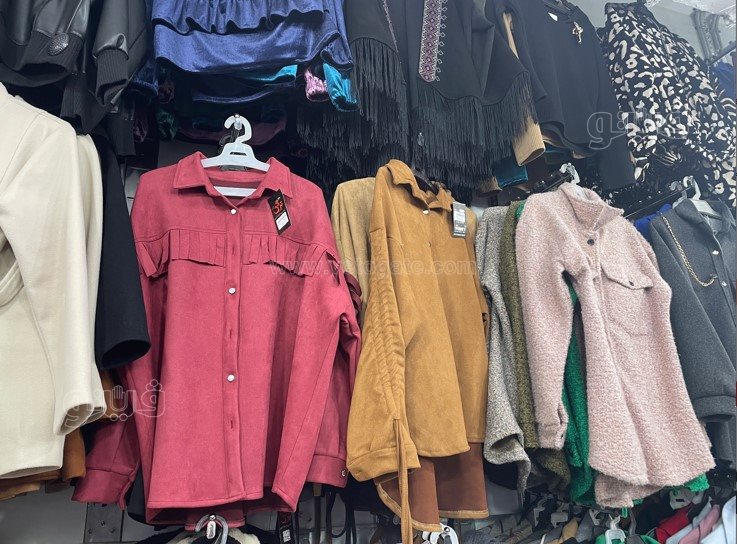 إقبال على شراء الملابس الشتوي مع احتفالات عيد الميلاد (10)