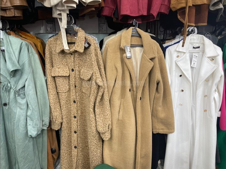 إقبال على شراء الملابس الشتوي مع احتفالات عيد الميلاد (12)