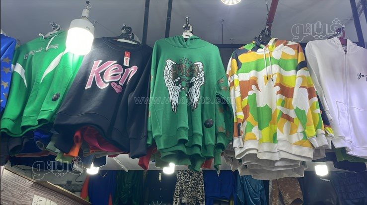 إقبال على شراء الملابس الشتوي مع احتفالات عيد الميلاد (20)