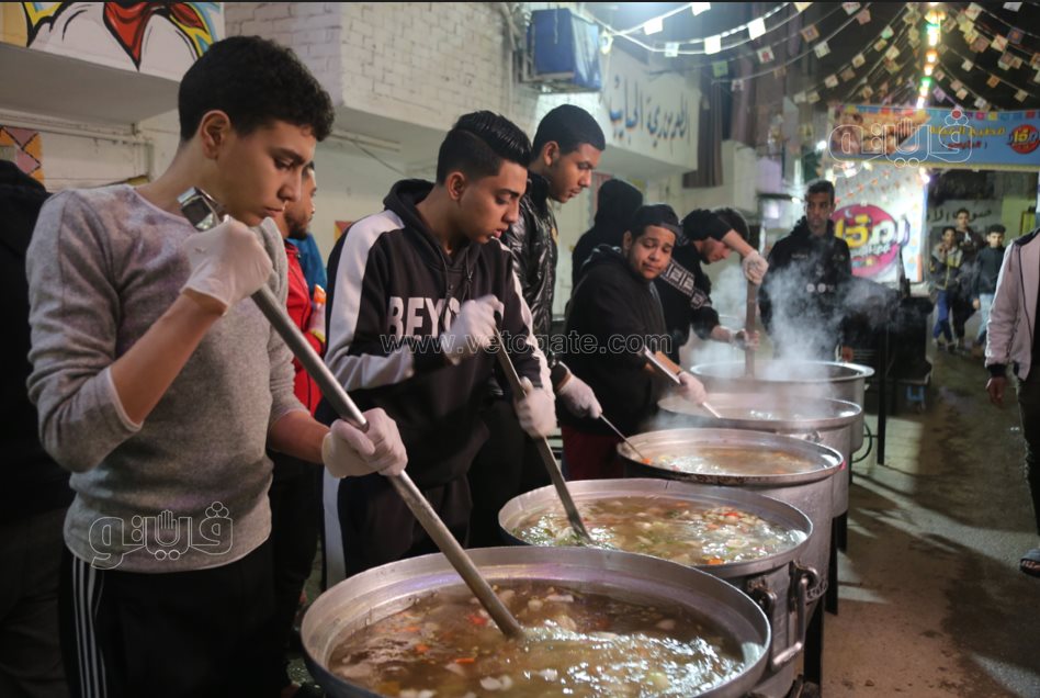 تجهيزات أطول مائدة إفطار جماعي في المطرية (22)