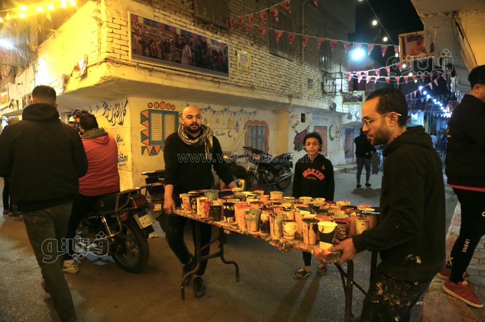 تجهيزات أطول مائدة إفطار جماعي في المطرية (27)