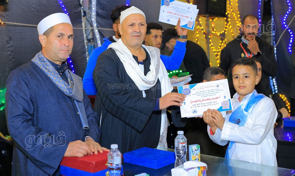 جانب من  احتفالية تكريم حفظة القرآن الكريم بالقرية العاشرة مدرسة، فيتو