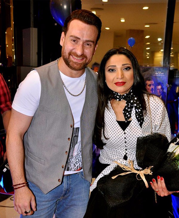 نضال الشافعي وزوجته