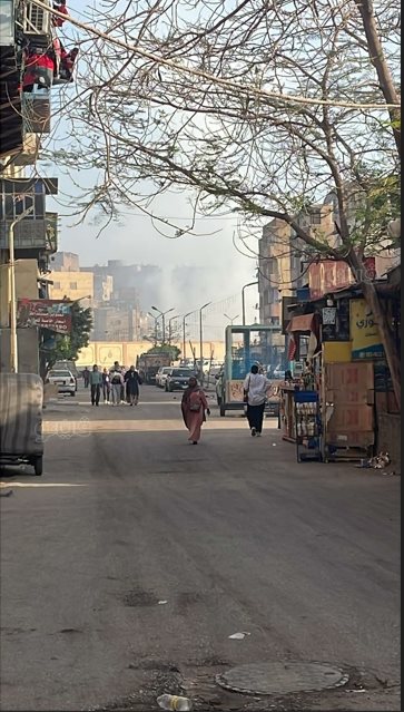 إجراء عمليات التبريد لحريق مغالق الأخشاب بالشرابية (1)