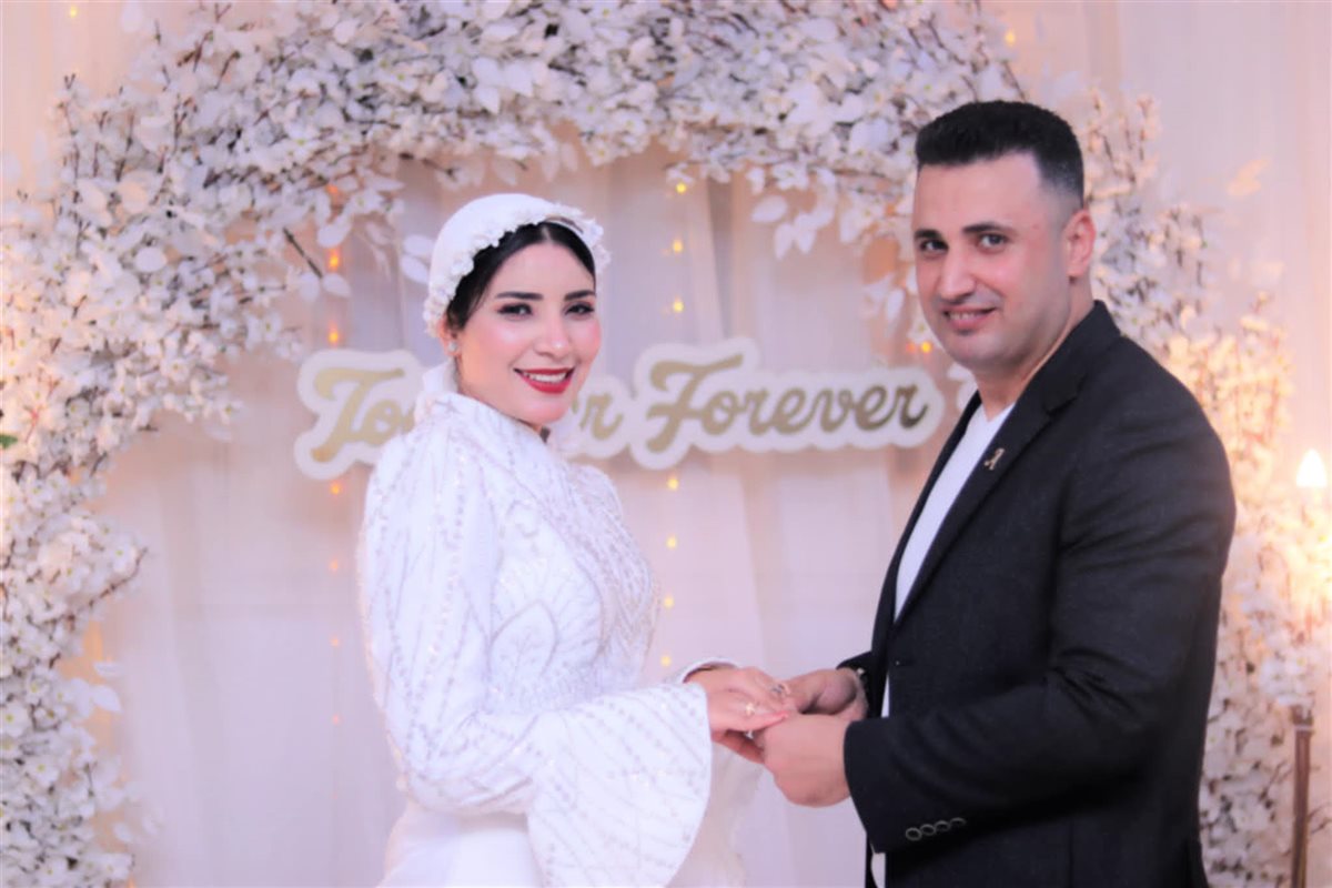 الزميل أحمد رأفت وخطيبته آية صلاح 