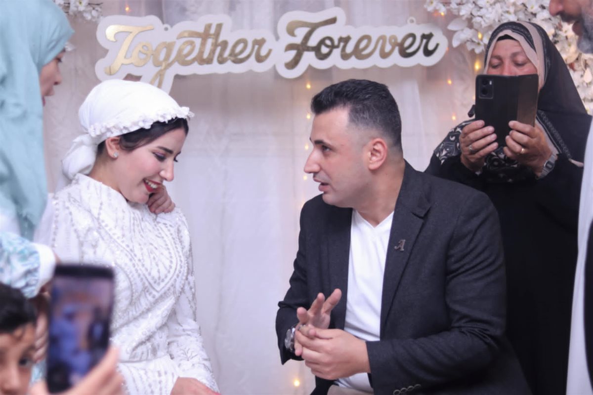 الزميل أحمد رأفت وخطيبته آية صلاح 