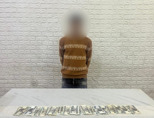 القبض على لص سرق مبلغًا ماليًا من داخل محل في الخليفة بأسلوب المغافلة