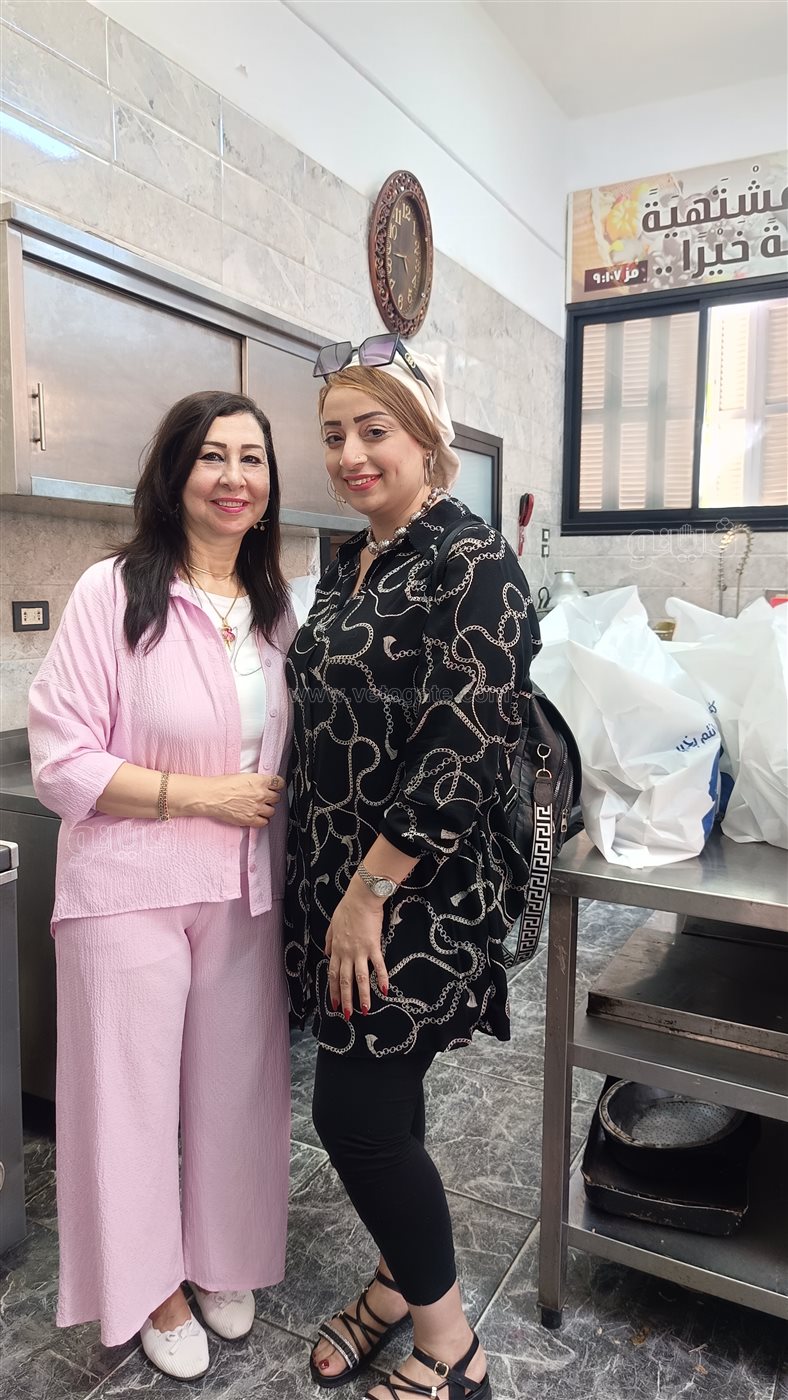 فيتو في مطبخ الكنيسة الإنجيلية خلال تجهيز وجبات الإفطار، فيتو