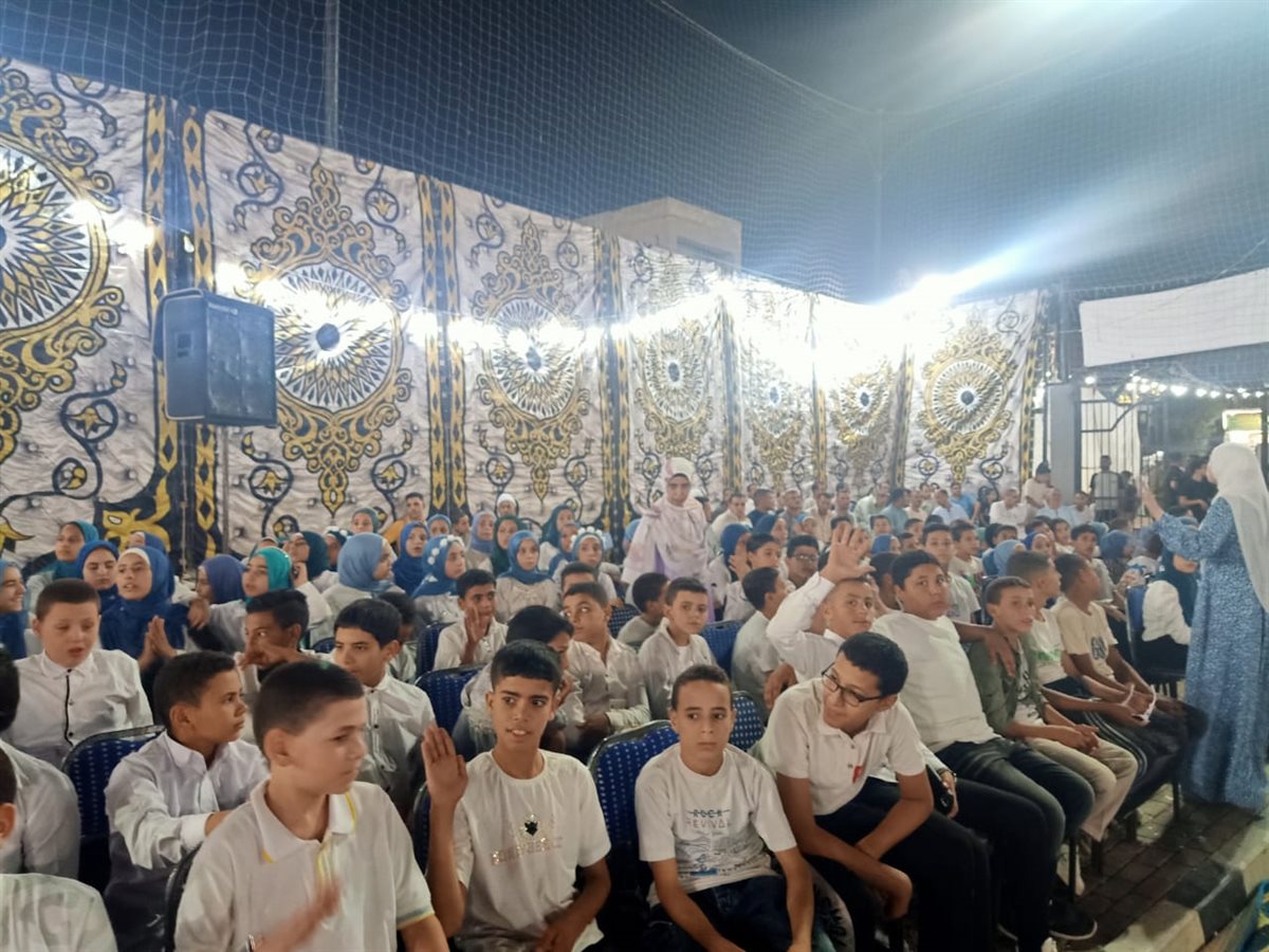 جانب من حفل تكريم حفظة القران الكريم بقرية الرياض ببني سويف