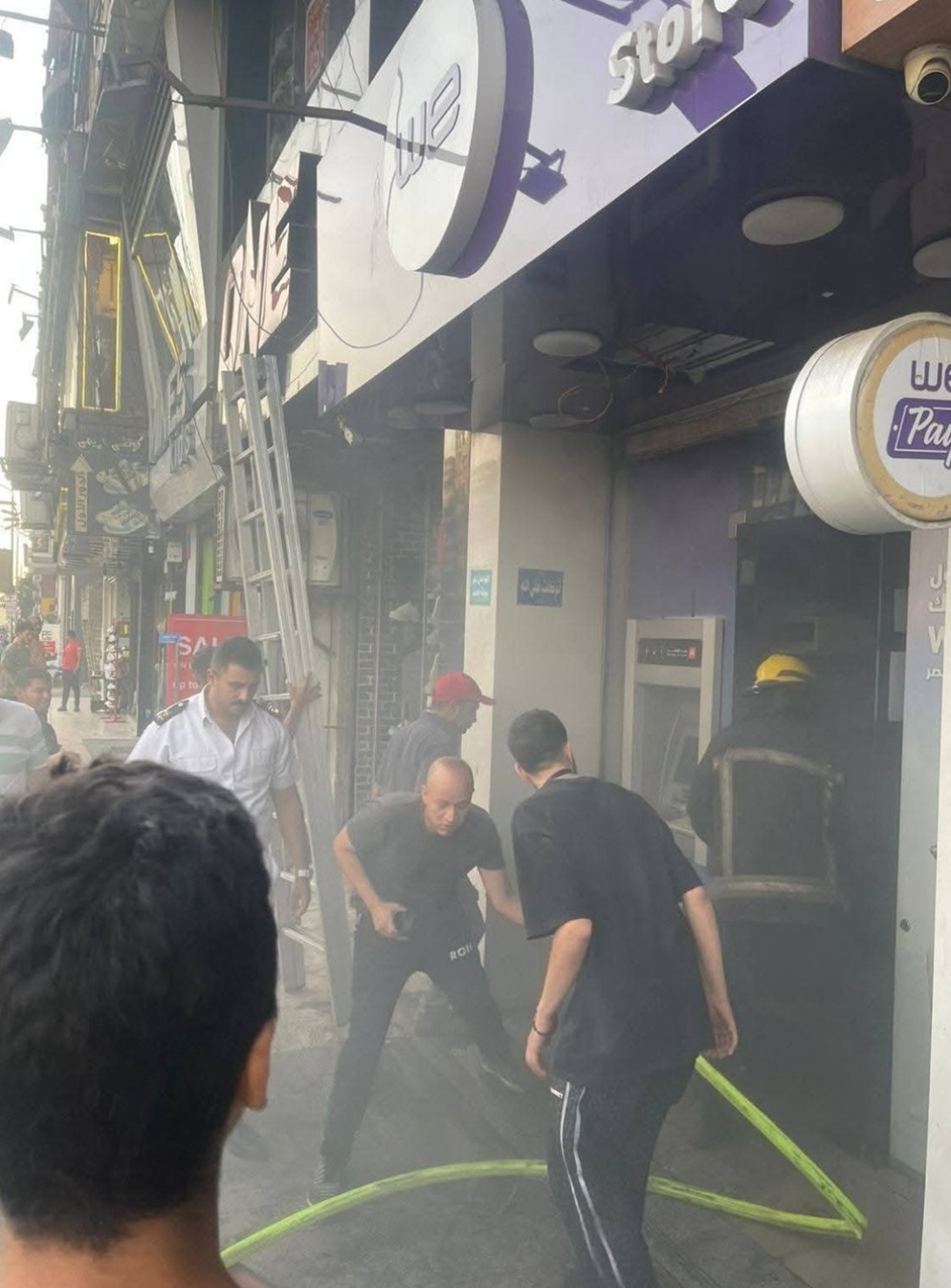 حريق فرع شركة WE بالألف مسكن