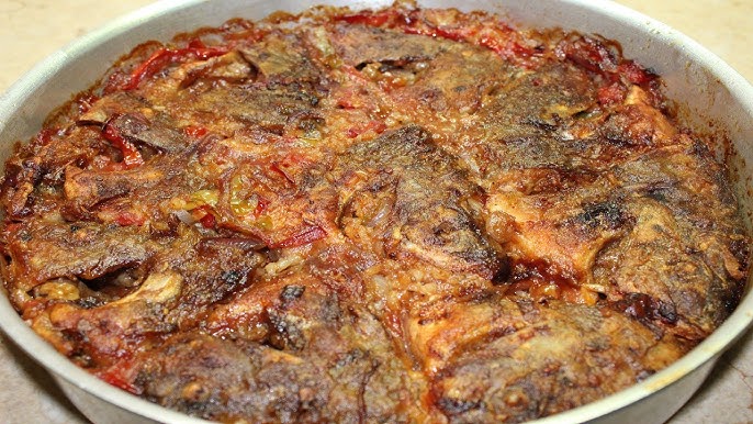 طريقة عمل صينية السمك بالصلصة فى الفرن 