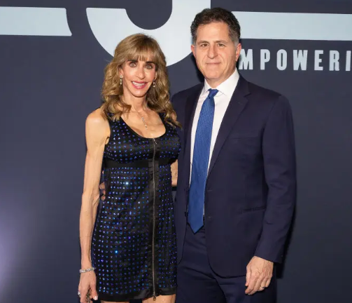 سوزان ديل مع زوجها مايكل ديل، فيتو