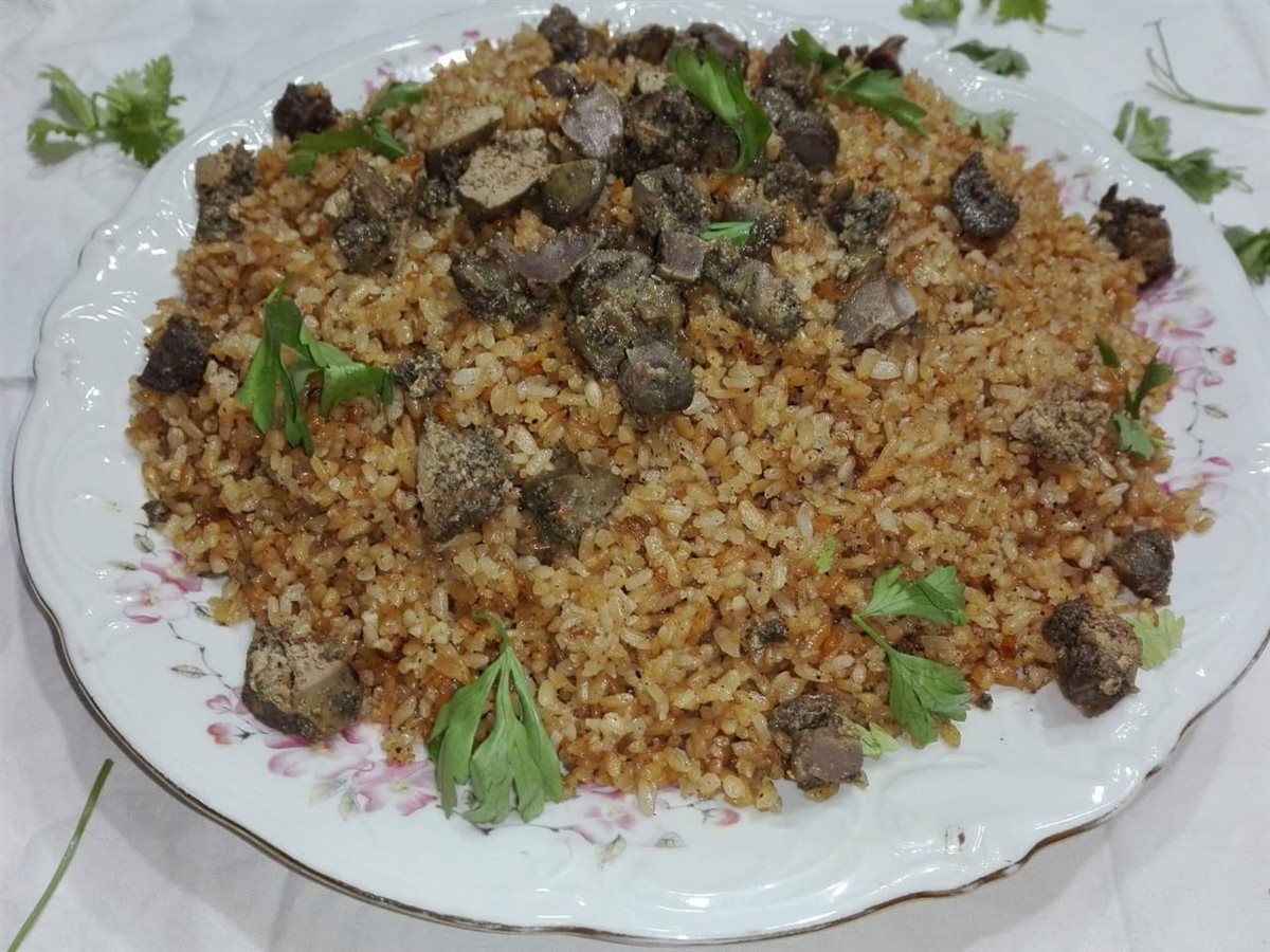 طريقة عمل الأرز بالخلطة والكبد والقوانص