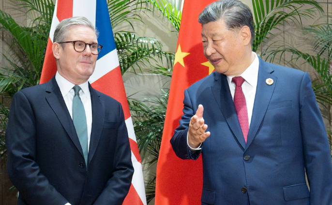 رئيس وزراء بريطانيا مع الرئيس الصيني، فيتو