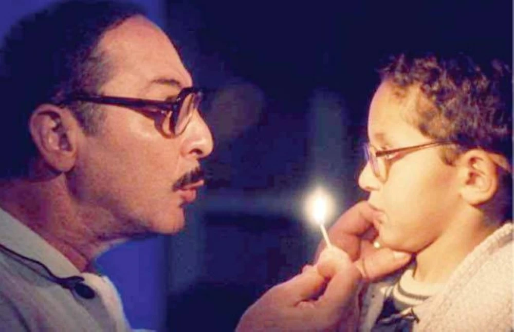 محمود حميدة ويوسف عثمان فى مشهد من بحب السيما