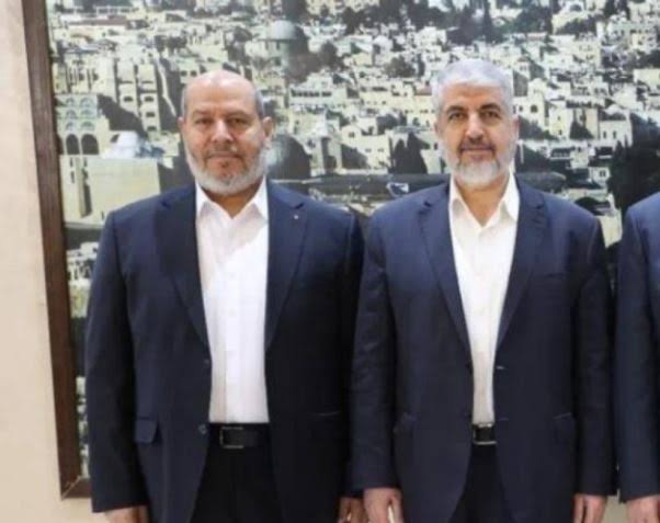 الحية والقيادي البارز بحركة حماس خالد مشعل
