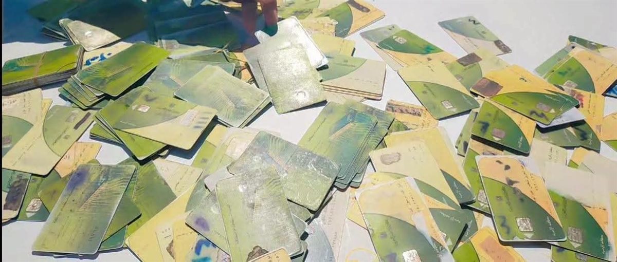 تجميع بطاقات تموينية في فرن بلدي