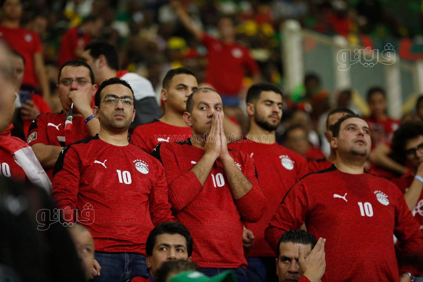 مصريون يشجعون المنتخب بالكاميرون (13)