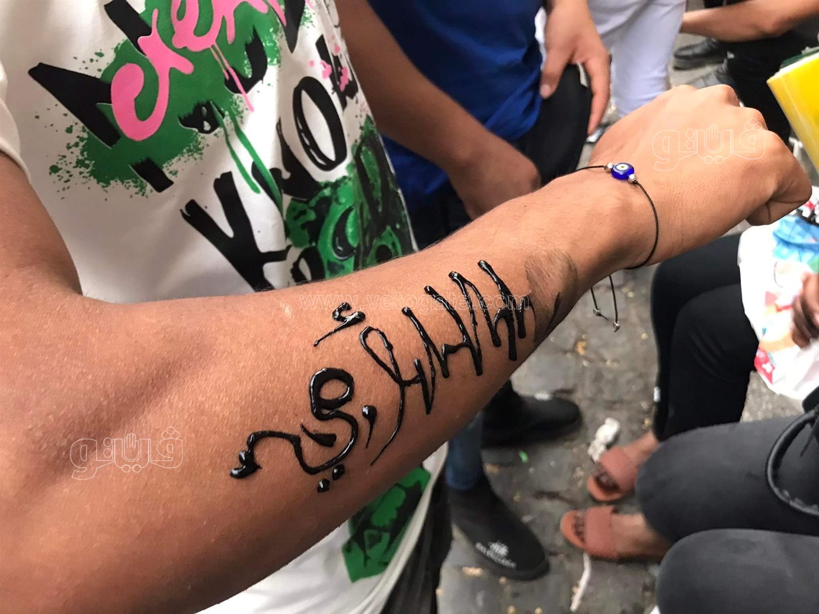 التاتو يجذب زوار شارع المعز في ثاني أيام عيد الفطر (3)