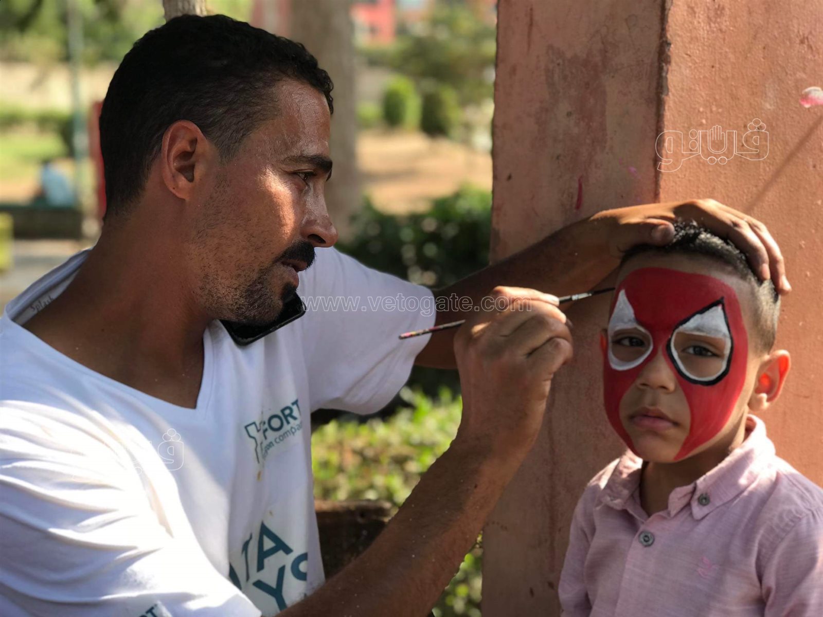 رسم التاتو وأقنعة الحيوانات والملاهي أبرز مظاهر الفرحة في الحديقة اليابانية (14)