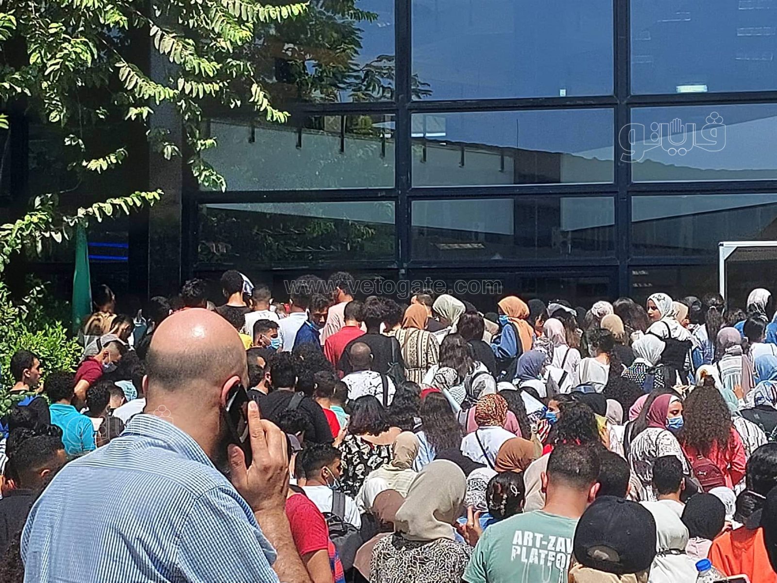 زحام طلاب الثانوية أمام كلية الإعلام بجامعة القاهرة لأداء امتحان القدرات (13)
