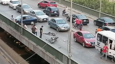 مع الإفطار.. مصرع شخص وإصابة آخر فى حادث تصادم أعلى كوبرى أكتوبر | فيديو وصور