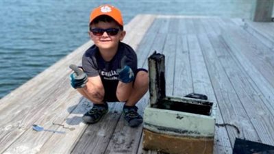 صبي يصطاد صندوق مجوهرات من بحيرة في ولاية كارولينا الأمريكية|صور