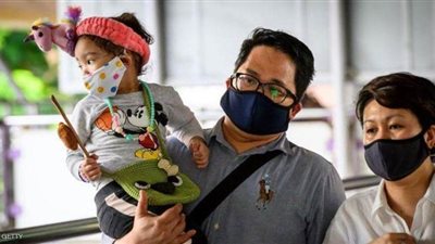 اليابانيون يُحذرون من خطر الكمامات على الأطفال