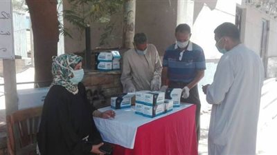 زيادة منافذ بيع الكمامات في قنا | صور