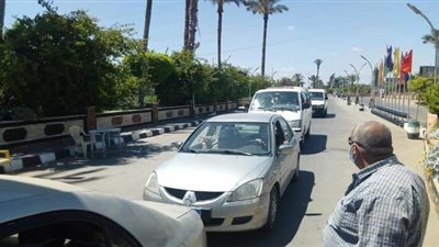 حملات مكبرة لمتابعة تطبيق ارتداء الكمامات على مداخل مدينة جمصة | صور