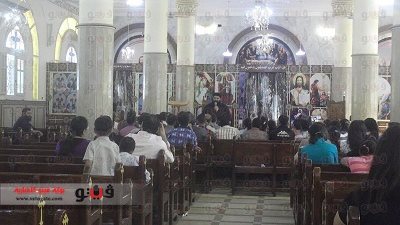 بالصور.. كنائس قنا تودع الجمعة العظيمة وسط إجراءات أمنية مشددة