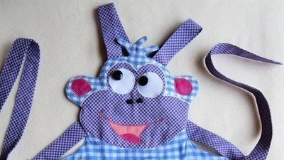 بالصور.. اصنعي لبناتك «مريلة مطبخ» مرحة لمساعدتك