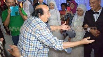 بالصور.. عبد الله مشرف يفاجئ يتيمات المعادي بحضور حفل زفافهن