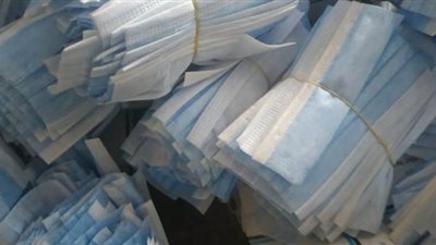 ضبط 80 ألف كمامة مجهولة المصدر داخل مصنع غير مرخص بالإسكندرية | صور