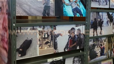 بالصور.. جناح فلسطين بمعرض الكتاب يبرز صور العدوان الإسرائيلي