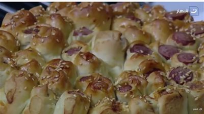 وصفة جديدة.. تعرفي على طريقة عمل تورتة عجينة السوسيس| فيديو 