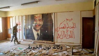 بالصور.. لافتات لـ«صدام حسين» في مقرات «داعش» بالعراق