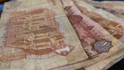 مصرفيون: الإفراج عن قرض صندوق النقد يتطلب تعويم الجنيه