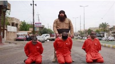 بالصور.. «داعش» يذبح مقاتلا كرديا ويهدد البرزاني