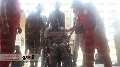 بالصور.. الهلال الأحمر يساعد المعاقين على التصويت بالجامعة العمالية