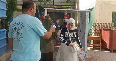 تعقيم الطلاب وكشف عن الحرارة وانتشار أمني مكثف في لجان الدقهلية | صور