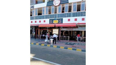 إزالة إشغالات الباعة الجائلين بكورنيش الإسكندرية | صور