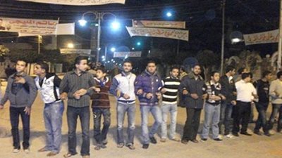 اللجان الشعبية بالقصاصين تحمى نقطة الشرطة والكنيسة