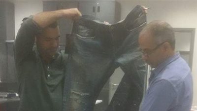 لجنة جمركية لفحص بنطلون سعره 850 جنيها إسترليني بمطار القاهرة