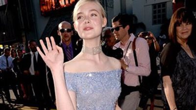 بالصور.. إيلي فانينج تخطف الأضواء من أنجلينا جولي في العرض الخاص بـ Maleficent