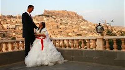 بالصور.. زفاف أطول رجل في العالم