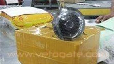 ضبط لمبة مزودة بكاميرات تجسس داخل طرد بمطار القاهرة