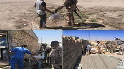 الجيش العراقي يوزع سلات غذائية للعوائل المتضررة جراء كورونا