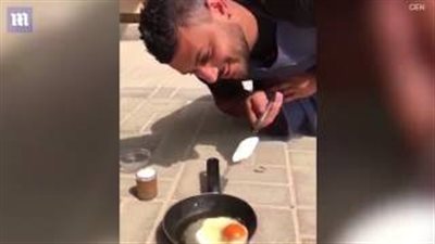 بالفيديو والصور.. شاب يسوي البيض بدرجة حرارة الجو في دبي