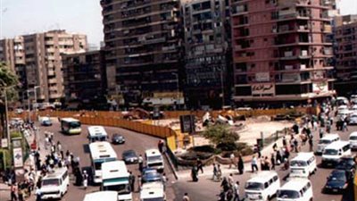 انتظام الحركة المرورية بميدان الجيزة